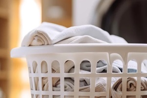 clean clothes from laundry basket fill bath room